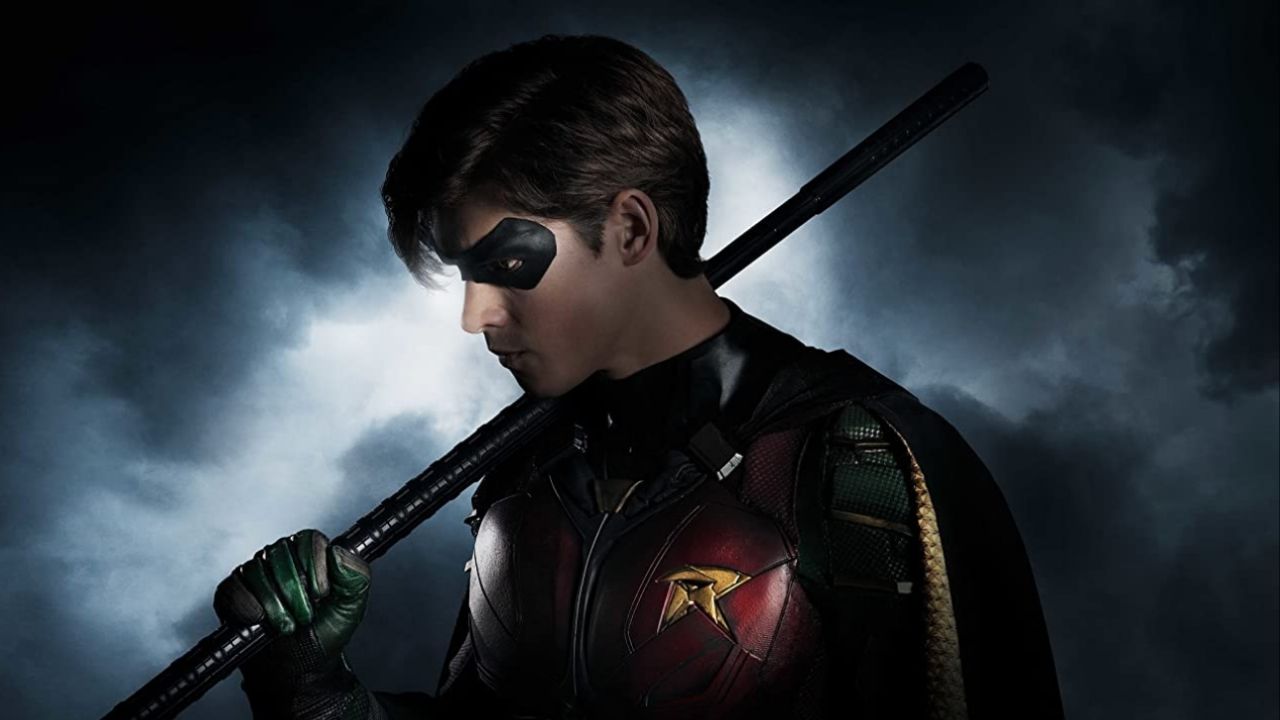 New Set Photo from ‘Titans’ Season 3 Teases Red Hood Costume & Logo cover