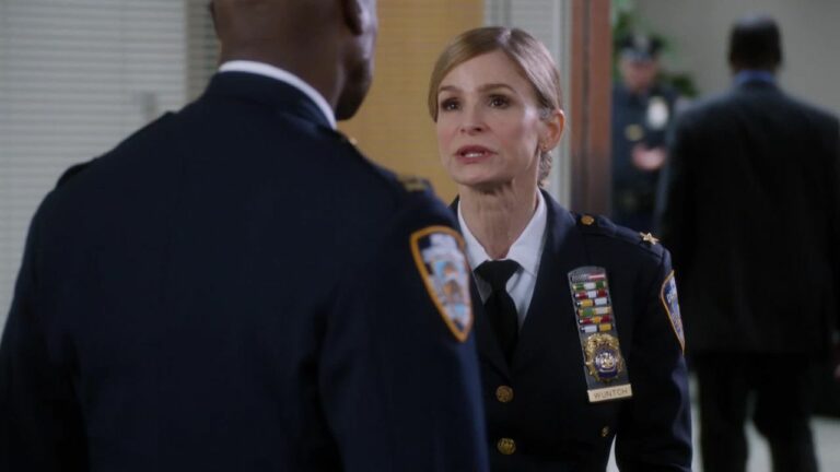 Does Holt become captain of the 99 again? Does he become commissioner?