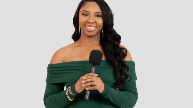 Arlette Amuli as the Producer of Pop the Balloon 